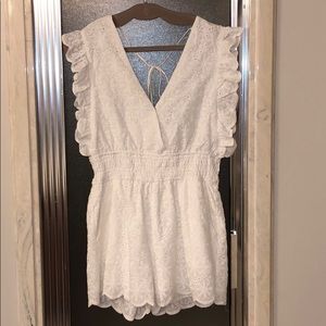 White lace romper with pockets. NWT!!